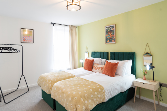 Second bedroom with zip-and-link bed that can be arranged as a king or two singles.