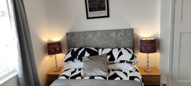 Beautiful room with double bed, wardrobe and dressing table. 