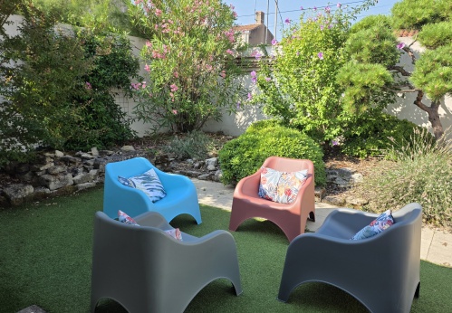 Fauteuils jardin + parasol