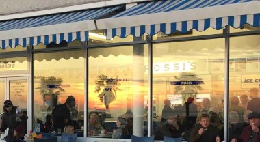 Rossie’s cafe famous for its ice-cream just 10 mins stroll away below Cliffs Pavillion theatre. Good breakfasts and lunches.  Good beach with good sandcastle-sand and safe bathing water. There is also a nice cafe just opposite the Cliffs Pavillion.