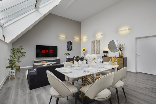 Enjoy meals together in this charming and well-set dining area.