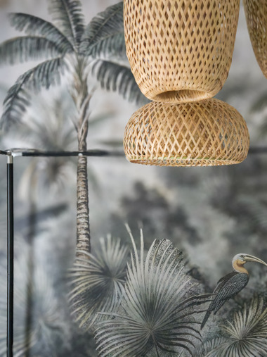 Woven textures and tactile finishes add depth and warmth to the space.