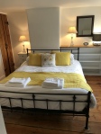 Bedroom 1 with iron bedstead