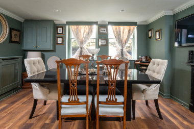 dining room with table seats up to ten
