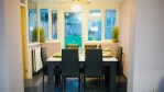 Dining area for 8 guests with brand new dining table chair set and crockery sets