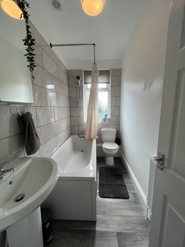 Bathroom - Modern 3 piece suite with shower and bath