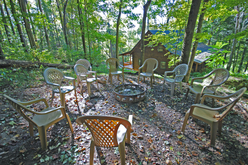 Closeup of Fire Pit Area, with Rocky View Lodge beyond