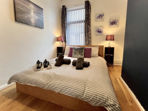 Bedroom 2 - Experience blissful rest with our plush and inviting bedroom setting