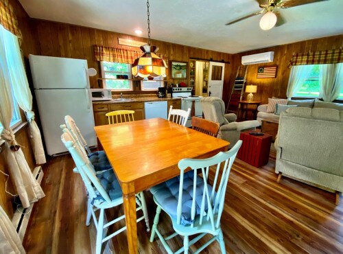 Dining area and kitchen w/dishwasher and all you need for cooking. 