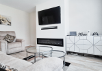 Living room: Comfy seating with Smart TV