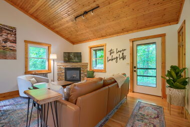 Perfect family space with smart TV, game table, gas fireplace and cozy furniture