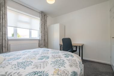 Bedroom 2 with work table and chair