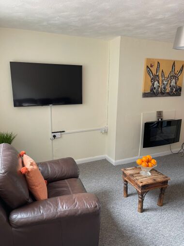 Homely lounge with plenty of comfortable seating