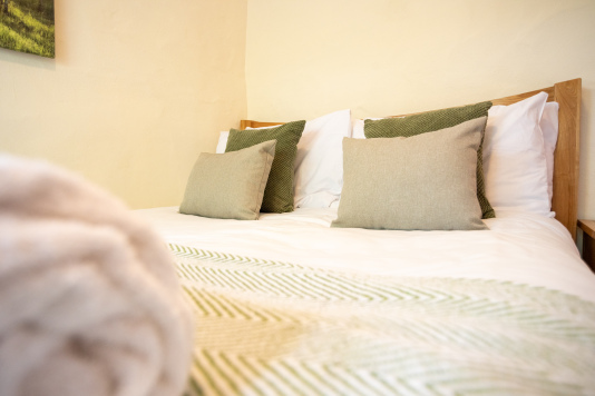 Light and inviting double bedroom offering a peaceful retreat after days spent exploring North Devon's beaches and coastal paths.