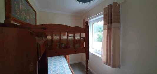 Bedroom off a main bedroom, this is the 1/2 bedroom