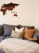 Sink into the spacious 4-seater chaise sofa, thoughtfully styled with plush cushions, a cosy blanket and a soft rug for maximum comfort.