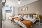 Main bedroom with a comfortable double bed, offering a peaceful retreat for restful nights and relaxing mornings.