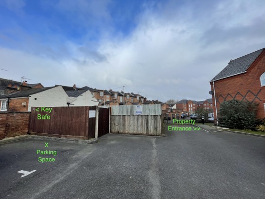 Parking space, key safe and entrance