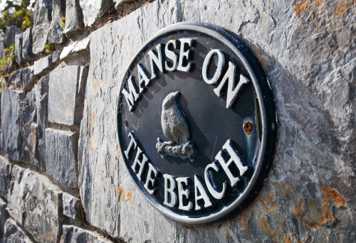 A welcome awaits at the Manse on the Beach