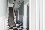 Beautiful elegant hallway, renovated sympathetically with original staircase in place.