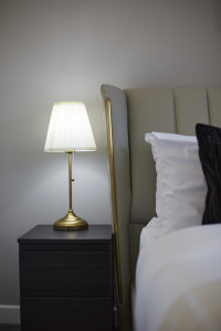 Your private retreat: a stylish double bedroom with a calm, welcoming feel.