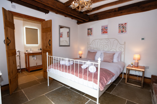 Beautiful ground-floor bedroom with ramp access, no stairs, and its own bathroom with walk-in shower, toilet and complimentary toiletries