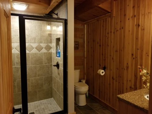 Main Floor Bathroom Custom Shower Look in the cubby area when you stay
