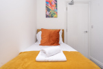 A clean, cosy single bedroom offering peaceful rest and complete privacy.