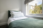 Two full size single beds in the third bedroom - which is bright and airy designed for comfort, style, and ultimate relaxation.