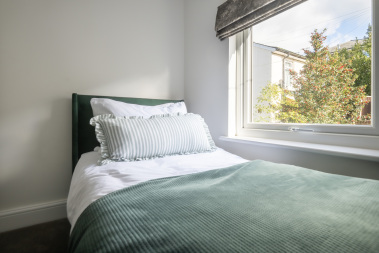 Two full size single beds in the third bedroom - which is bright and airy designed for comfort, style, and ultimate relaxation.