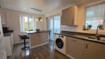 Cook together, eat together, relax together. The island is the centrepiece of this family kitchen