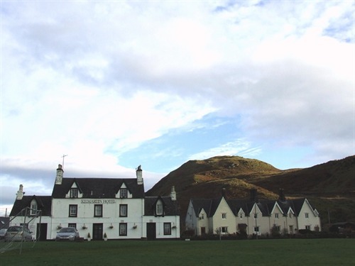 View of the Hotel from the Village Green, with the Kilmartin Hill behind