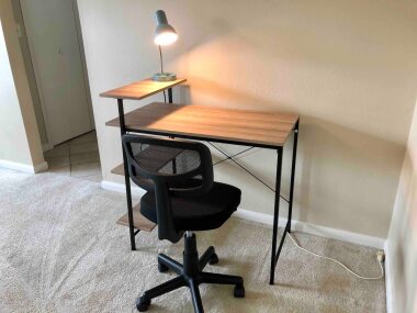 Computer desk and chair to finish up some work in the privacy of your own room.