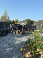 Communal garden area with sheltered seating