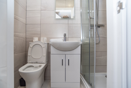 Private en-suite with shower and WC, offering comfort and convenience during your stay.