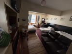 Spacious with 2 single beds and a double bed.