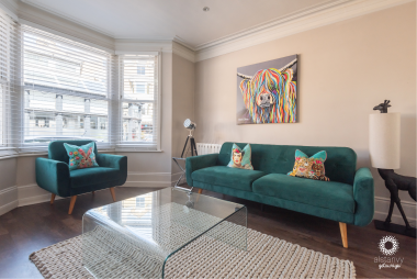 Comfortable sofa bed with additional arm chair, perfect for the third guest / child