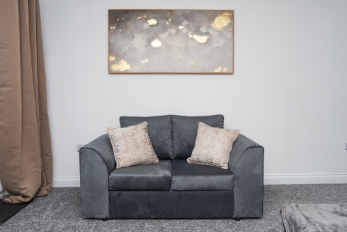 Comfortable, fully equipped sofa bed offering extra sleeping space without compromising the spacious, modern living area.