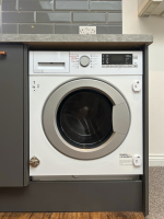 Stay Fresh During Your Huddersfield Visit – On-Site Laundry Facilities Available