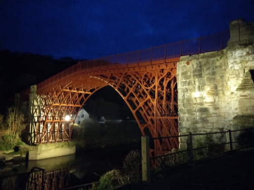 The Iron Bridge is lit up in the evening