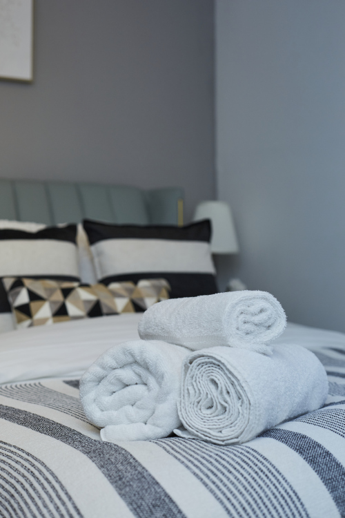 A thoughtfully furnished double bedroom, perfect for a comfortable and relaxing stay.