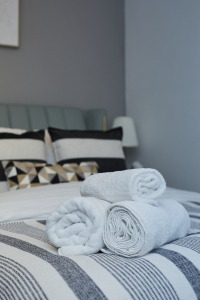 A thoughtfully furnished double bedroom, perfect for a comfortable and relaxing stay.