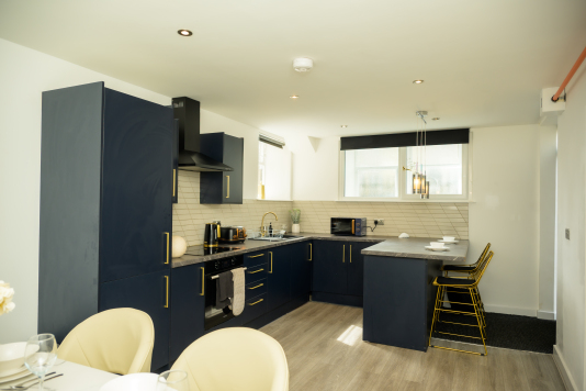 Clean and functional kitchen designed for convenience and ease.