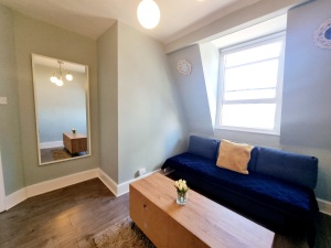 This photo represents the living room of the flat