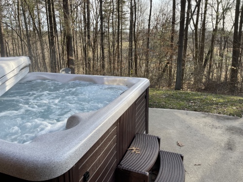 Hot tub in the woods.  Relax!