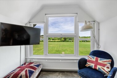 Gorgeous views from the lounge across the playing fields towards Hythe and Saltwood