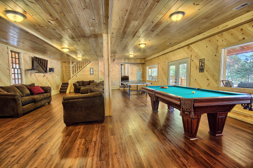 Entertainment room, Pool Table, Ping Pong Table, stairway to North Side, The Western Lodge