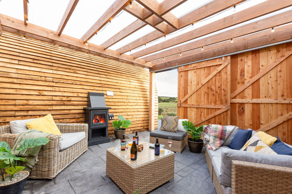 [{'Text': 'Pergola area', 'CultureCode': 'en-GB'}] glamping cabins and grounds, photo 18 of 32