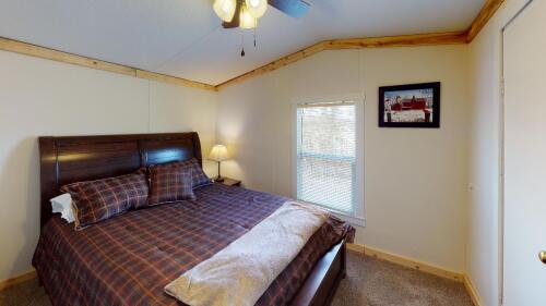 This is the first bedroom in the cabin featuring a Queen sized bed 