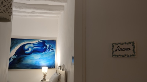 Camera Tripla-Superiore-Bagno in camera con doccia-Balcone-Amarea